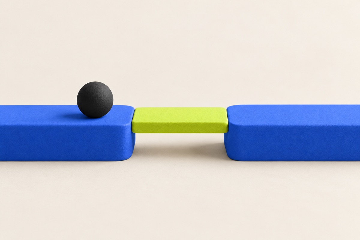 A small lime-green bridge joins two blue sections of a path, with a dark ball waiting to cross, illustrating specific help that unblocks progress.
